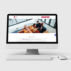 Website mockup displaying the CRS website ‘About CRS’ page with hero image of two people on a couch
